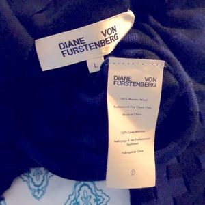 100% Merino wool blue/blk eyelets dress. NO stains